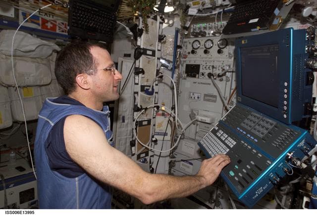 NASA image: Pettit works at the HRF workstation in Destiny during Expedition Six