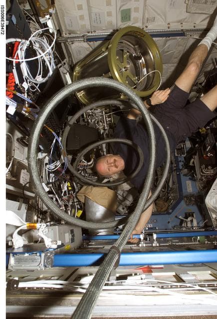 NASA image: Commander Kenneth D. Bowersox  posing with Supply Tank as part of the ITCS
