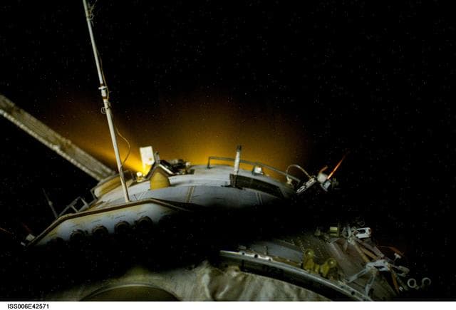 NASA image: View of Thruster exhaust plume deflectors and Kromka experiment on the SM during Expedition Six