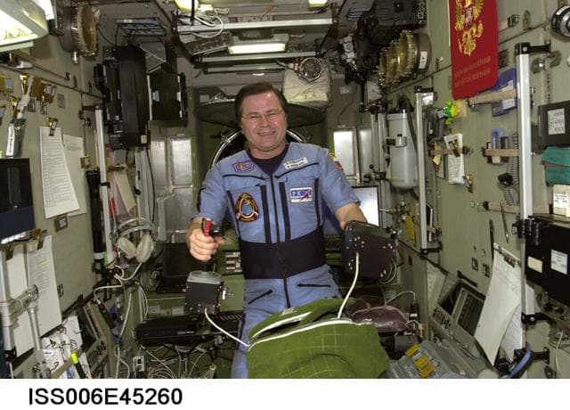 NASA image: Flight Engineer Nikolai Budarin operates hand controllers on the Robotic System in the SM