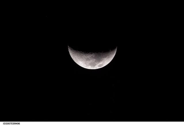 NASA image: A partial moon was photographed by an Expedition 7 crewmember