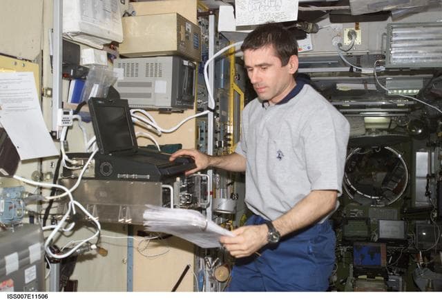NASA image: CDR Malenchenko entering data in Zvezda Service Module
