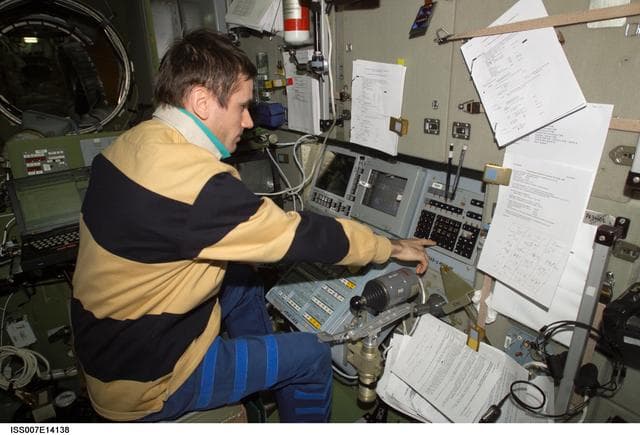 NASA image: Expedition Seven Malenchenko at Simvol-Ts controls in Zvezda module