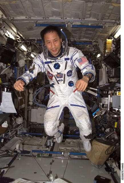 NASA image: Expedition Seven Lu wearing Sokol pressure suit in Destiny laboratory
