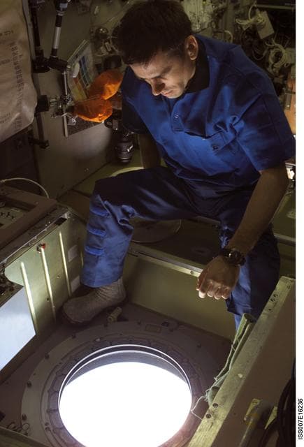 NASA image: Malenchenko with camera in Zvezda