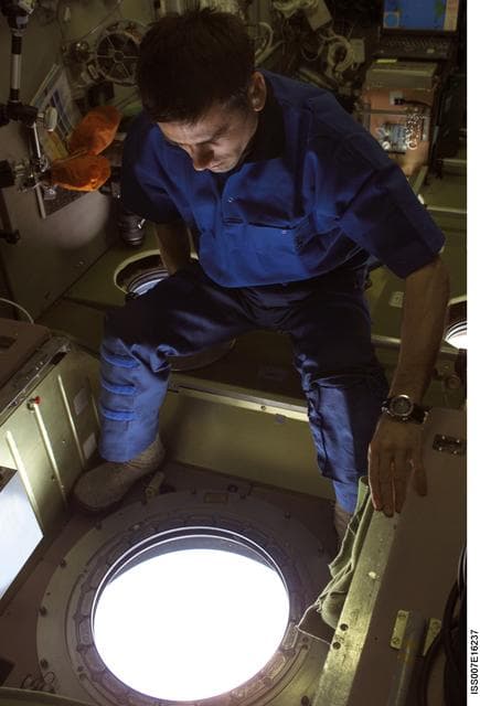 NASA image: Malenchenko with camera in Zvezda