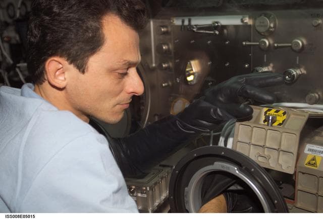 NASA image: Duque works at the MSG for PromISS 2  in the Lab during Expedition Seven / 8 OPS