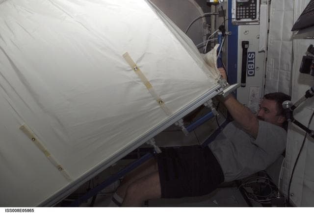 NASA image: Kaleri works with a ZSR in the Lab during Expedition 8