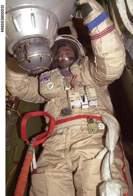 NASA image: Kaleri during Orlan suit-up dry run in the Soyuz TM-3 during Expedition 8