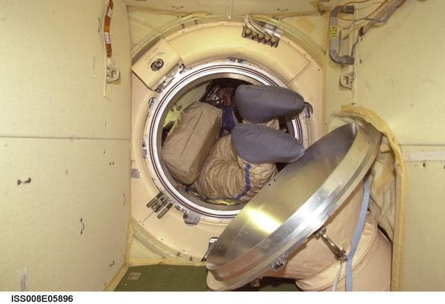 NASA image: Kaleri during Orlan suit-up dry run in the Pirs DC during Expedition 8