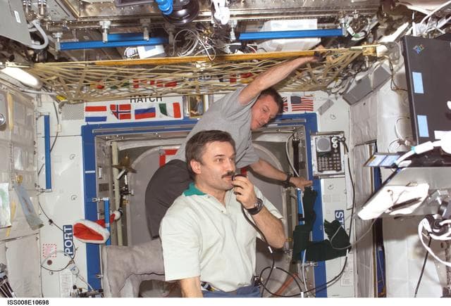 NASA image: Kaleri and Foale during telecon in the U.S. Lab during Expedition 8