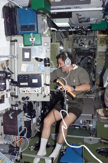 NASA image: Kaleri takes cabin pressure check readings in the SM during Expedition 8