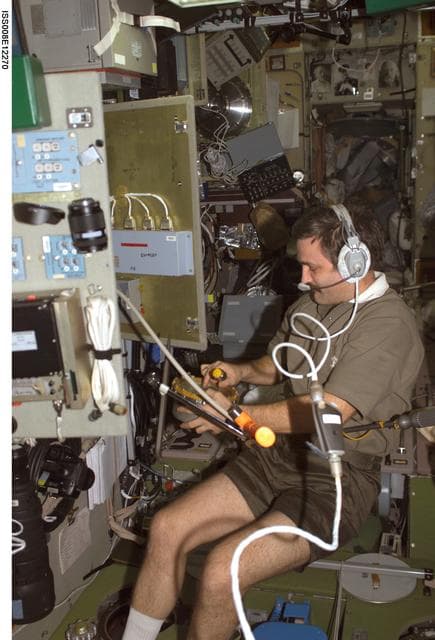 NASA image: Kaleri takes cabin pressure check readings in the SM during Expedition 8