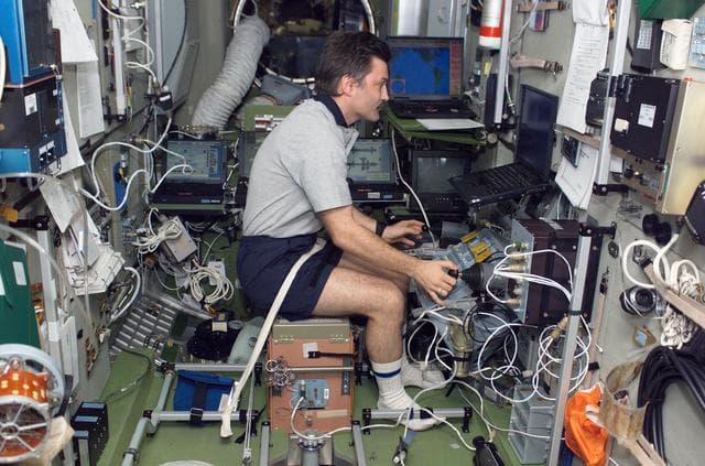 NASA image: Kaleri works with the TORU teleoperated control system in the SM during Expedition 8