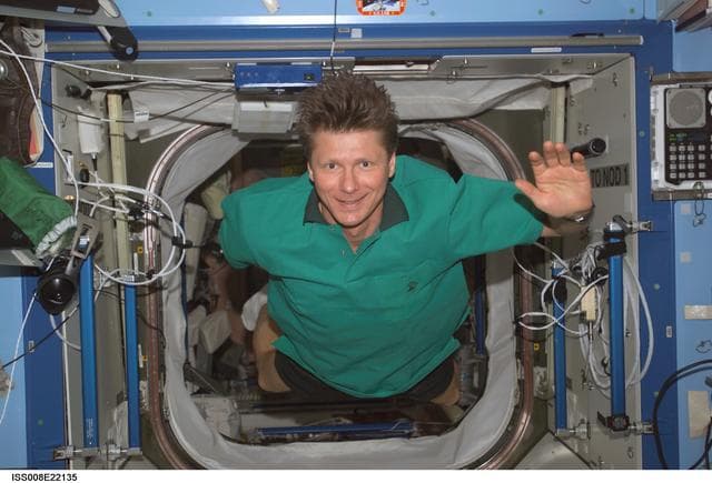 NASA image: Padalka waves hello from the U.S. Lab during EXP 8 / EXP 9