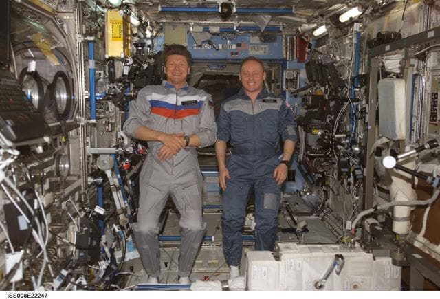 NASA image: Padalka and Fincke pose in the U.S. Lab during EXP 9 / EXP 8