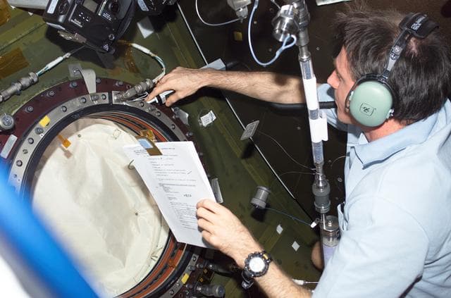 NASA image: Foale performs IFM at the science window in the U.S. Lab during Expedition 8