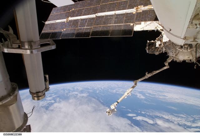 NASA image: Strela boom, FGB, PMA3, U.S. Lab, and SSRMS as seen during Expedition 8 EVA operations