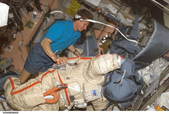 NASA image: Padalka checks out an Orlan suit during Expedition 9