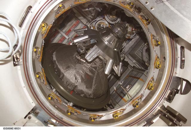 NASA image: Open SM/Progress transfer hatch and docking assembly during Expedition 9