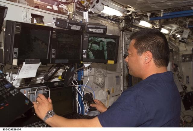NASA image: Chiao works at the SSRMS workstation as he performs Robotic Handover OPS during Expedition 9/10 joint OPS