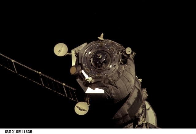 NASA image: Progress 15 supply vehicle undocks from the SM taken during Expedition 10
