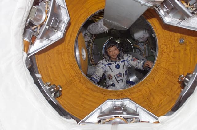 NASA image: Chiao wearing Sokol suit in the SM taken during Expedition 10