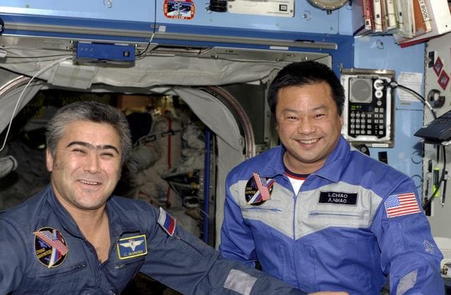NASA image: Sharipov and Chiao pose at the hatch area in the U.S. Laboratory during Expedition 10