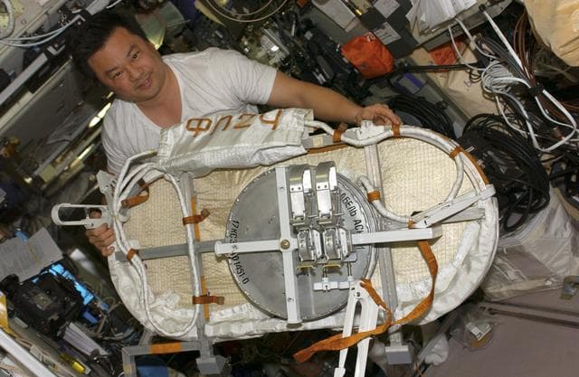 NASA image: Chiao holds GPS unit in the SM during Expedition 10