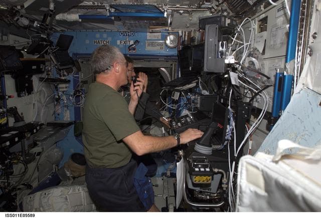 NASA image: Phillips and Krikalev  in U.S. Laboratory during SSRMS proficiency training