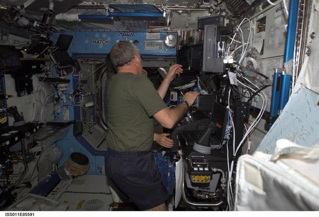 NASA image: Phillips and Krikalev  in U.S. Laboratory during SSRMS proficiency training