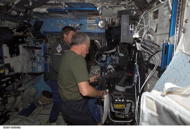 NASA image: Phillips and Krikalev  in U.S. Laboratory during SSRMS proficiency training