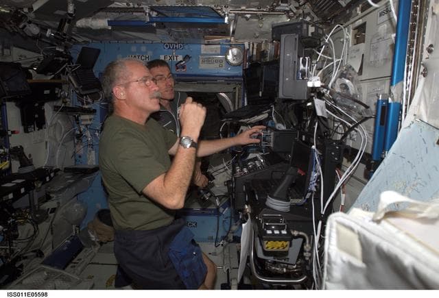 Phillips and Krikalev  in U.S. Laboratory during SSRMS proficiency training