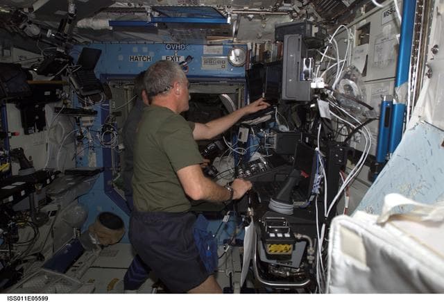 NASA image: Phillips and Krikalev  in U.S. Laboratory during SSRMS proficiency training