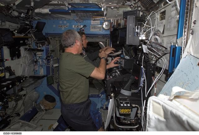 NASA image: Phillips and Krikalev  in U.S. Laboratory during SSRMS proficiency training
