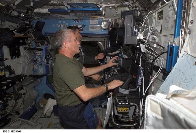 NASA image: Phillips and Krikalev  in U.S. Laboratory during SSRMS proficiency training