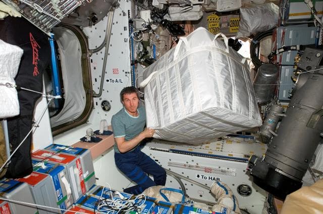 NASA image: Krikalev removes stowage from PMA2