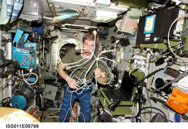 NASA image: Installing the new PCE (Proximity Communications Equipment) hardware