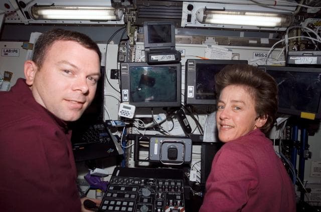 NASA image: Kelly and Lawrence in Destiny Laboratory module during berthing of MPLM