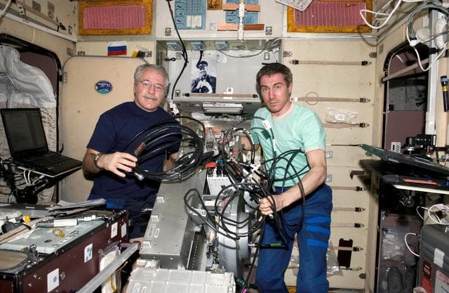 NASA image: Krikalev and Phillips with TVIS hardware in Zvezda