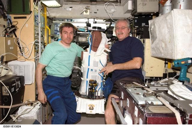 NASA image: Krikalev and Phillips with Matryoshka payload system