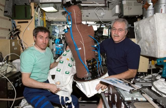 NASA image: Krikalev and Phillips with Matryoshka payload system