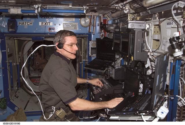 NASA image: McArthur works at the RWS surveying the ACBM during Expedition 12