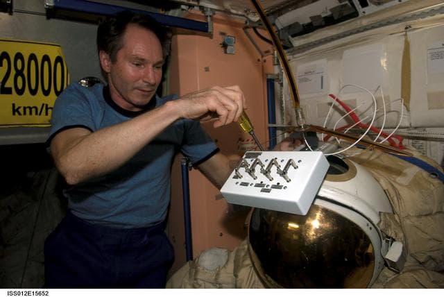 NASA image: Installation of control box and antenna for Radioskaf (Suitsat-1) on Expedition 12