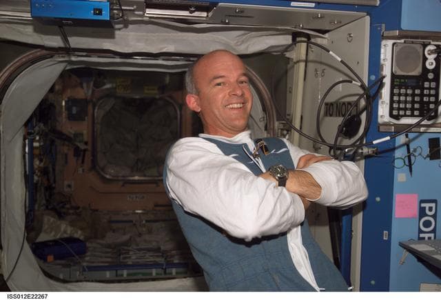 NASA image: Williams smiles as camera during Expedition 12/13 joint operations