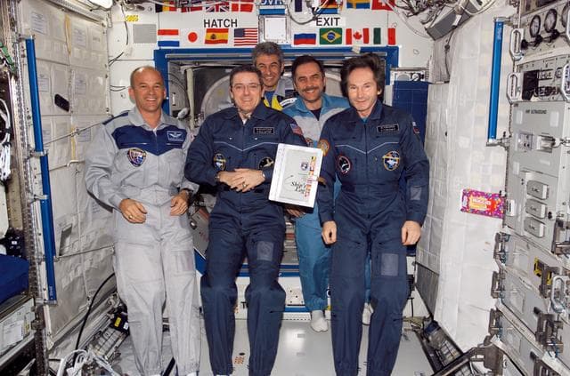 NASA image: Group shot of crews at the Change of Command Ceremony during Expedition 12/13 Joint Operations