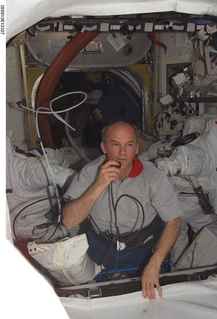NASA image: Williams uses communication equipment in the Airlock during Expedition 13