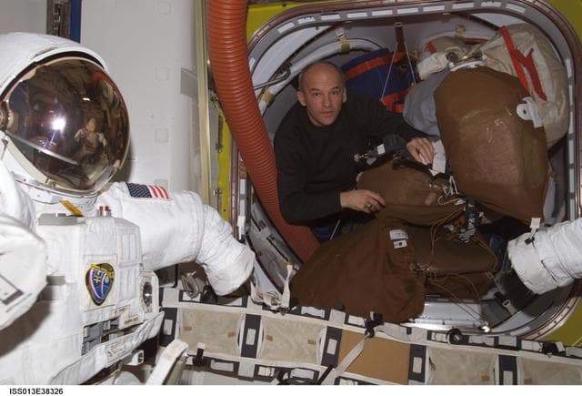 NASA image: Williams works in the Quest Airlock during Expedition 13