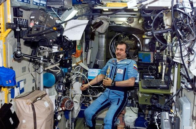 NASA image: Vinogradov uses a communication system in the SM during Expedition 13