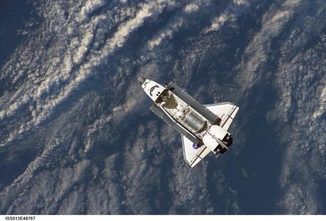 NASA image: Discovery approaching the ISS for docking during the STS-121 mission